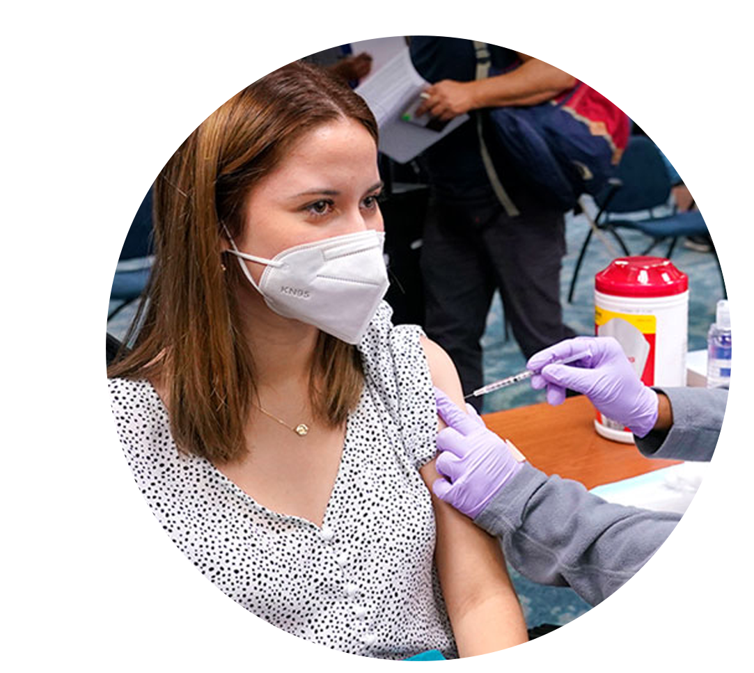 Natalia Dubom, of Honduras, gets the Johnson & Johnson COVID-19 vaccine at Miami International Airport on Friday, May 28, during an airport vaccination drive organized by Florida's Emergency Management Agency. Photo: The Associated Press